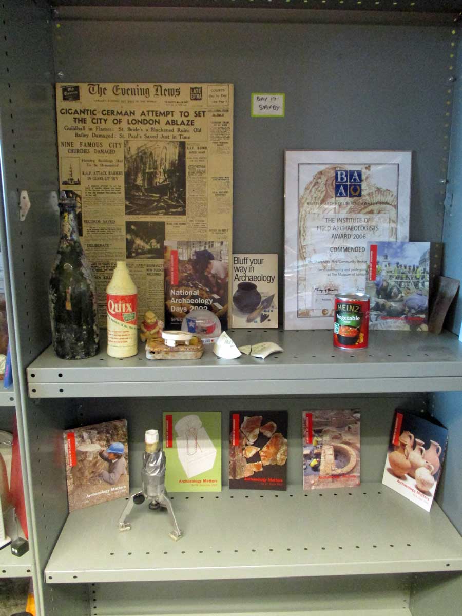 Photograph of shelves with momentos through the years displayed