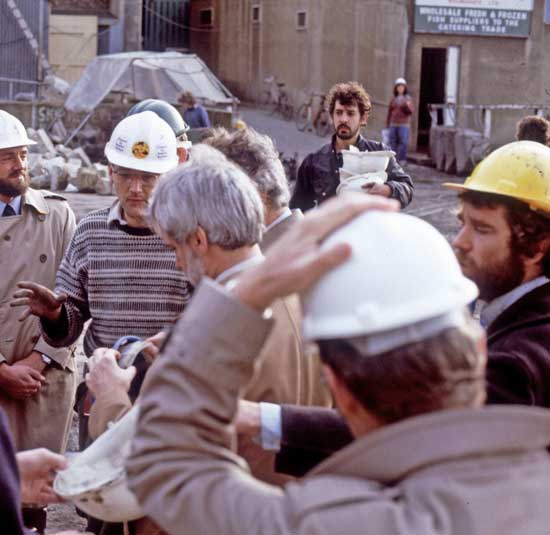 Chris on Billingsgate (back right) having started a small pop-up business selling safety helmets to the massing crowd prior to the arrival of Prince Charles. The photo also features archaeologists Derek Gadd and Steve Roskams. Photo: Jon Bailey ©MOLA