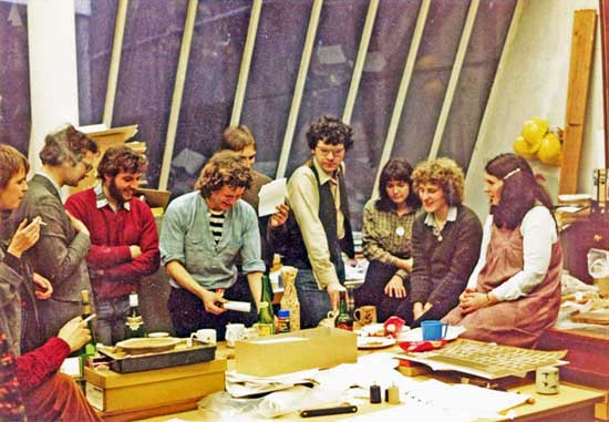 Tony Wilmott seen slicing-up the remains of the once massive ‘chocolate moose cake’ at the daily DUA Finds Section party at the Museum of London. Pictured from left to right: Gill Craddock, Patrick Allen, Mark Burch, Duncan Brown, Alan Vince, Tony Wimott, Sue Mitford, Jacqui Pearce, Kate Armitage (Photo from Paul Tyers)